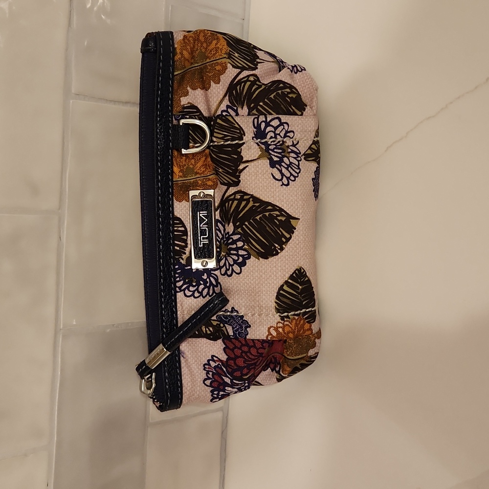 Limited addition Anna Sui for Tumi. Cosmetic bag.
